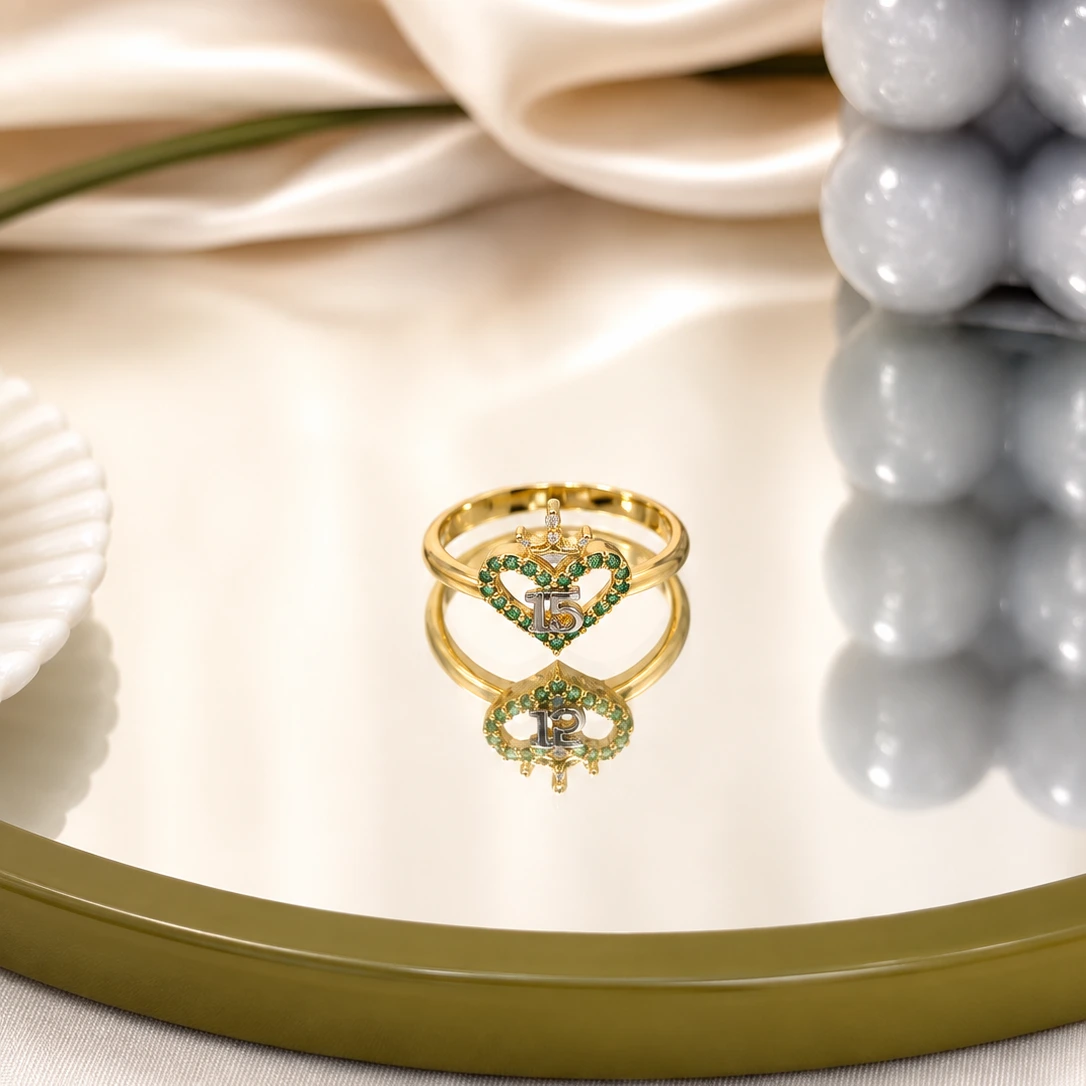 51. ANILLO DISEÑO EN CORAZON CON INCRUSTACIONES EN COLOR VERDE PESO_ 2.2 GR MEDIDA 5 1_