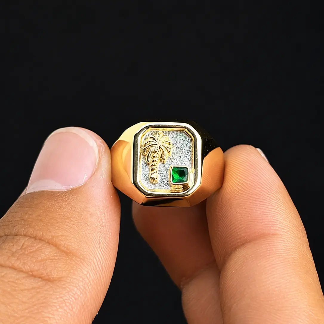 18.ANILLO CON DISEÑO DE PALMERA CON PIEDRA VERDE PESO_ 3.8 GR MEDIDA_ 12 1_2